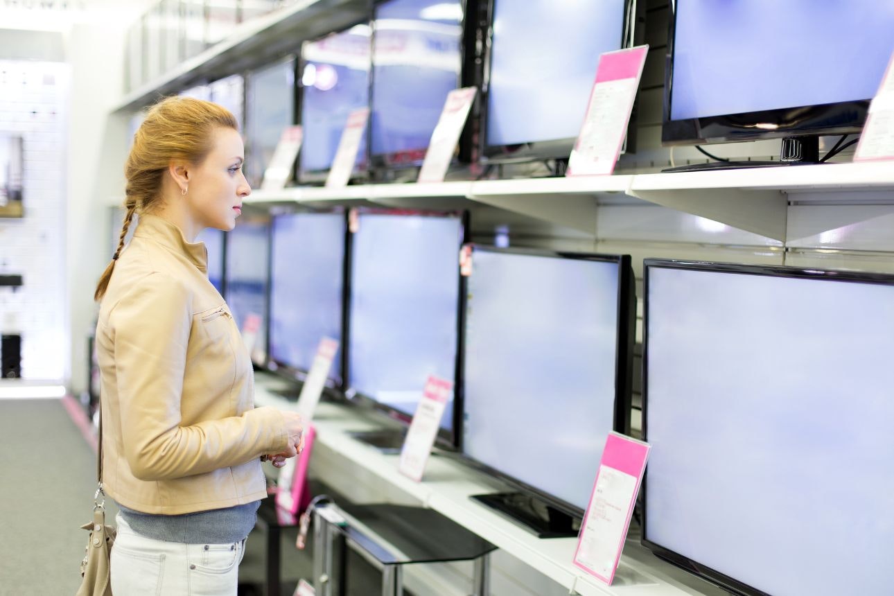 Woman shopping for a TV