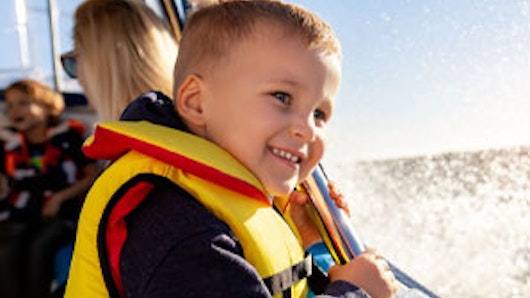 Image of kid wearing lifejacket