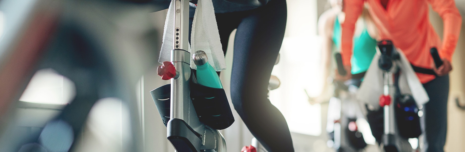 Woman on cycle machine at the gym