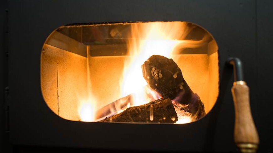 There is no known lower "safe" limit for the pollution that woodburners produce.
