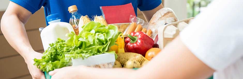 Box of fresh food being delivered.