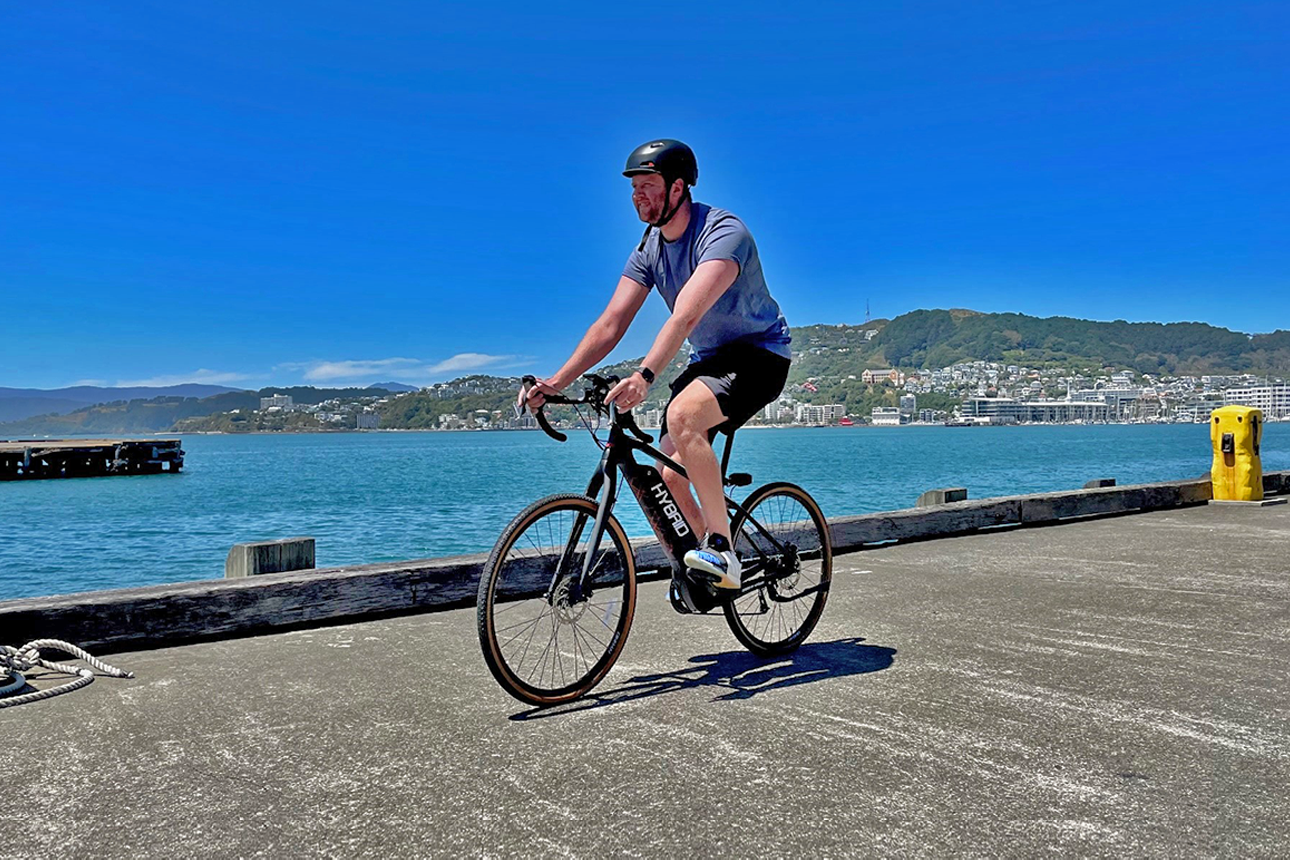 Photograph of writer testing e-bike on Wellington waterfront.