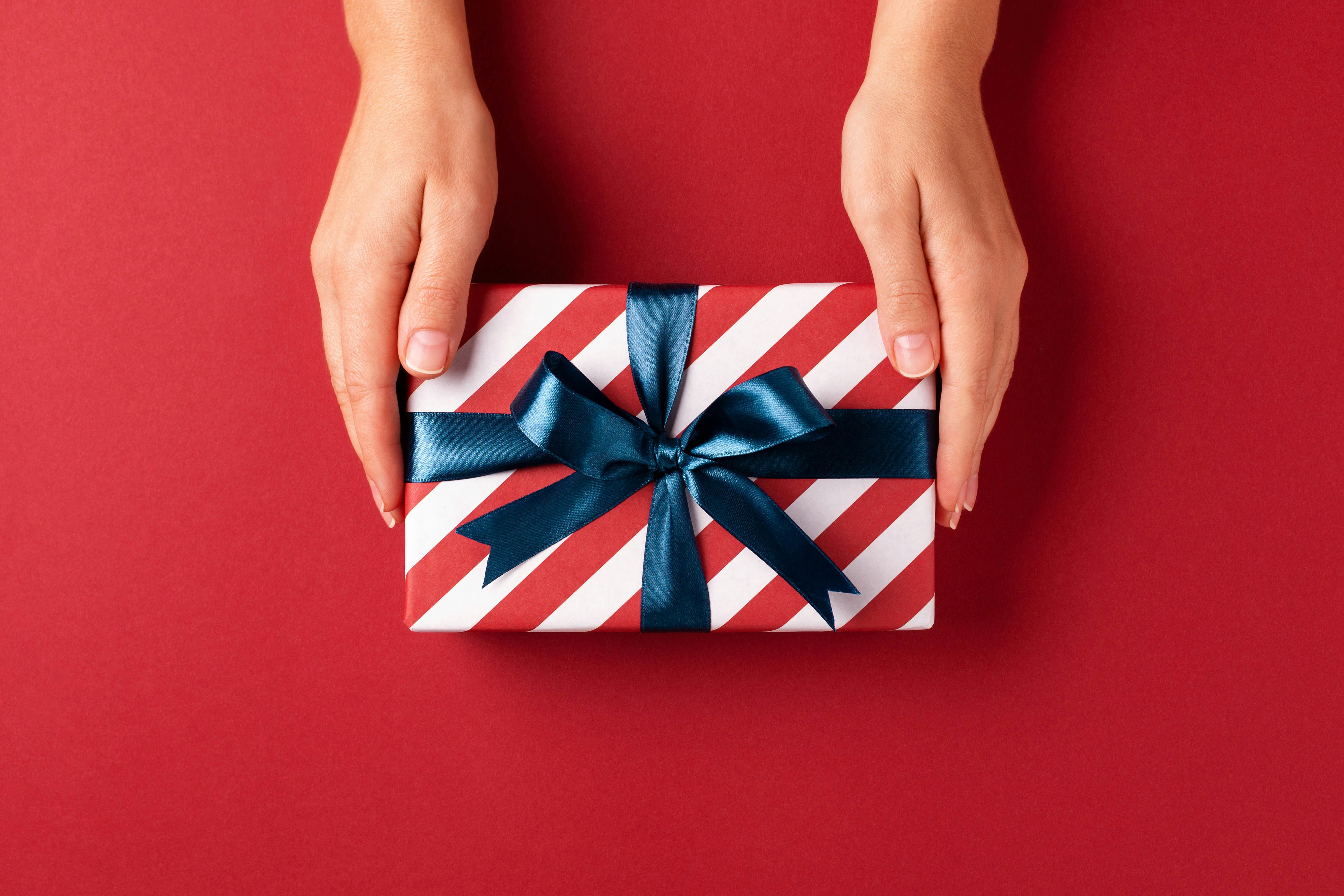 Hands holding a gift