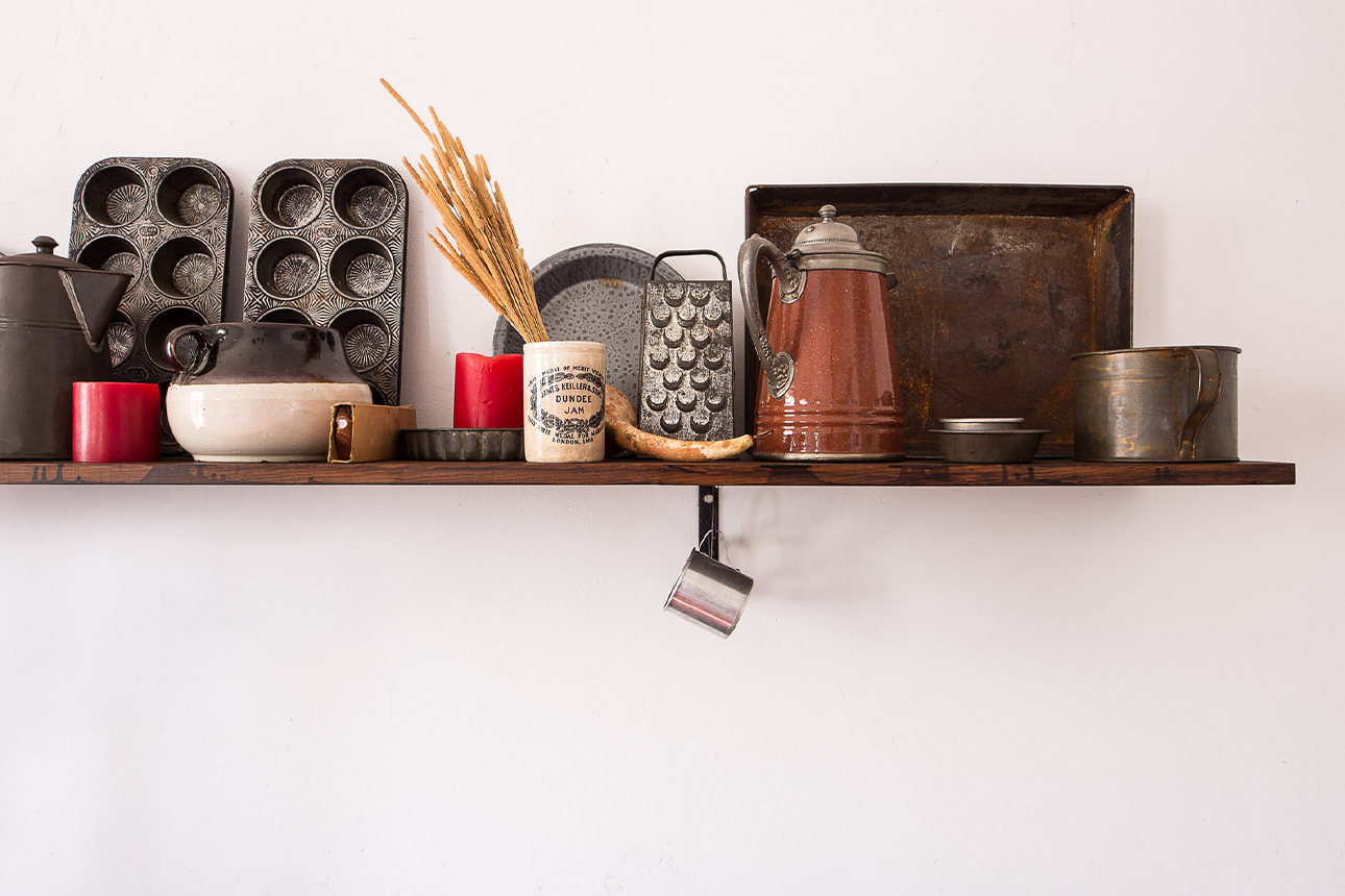 Photograph of bunch of kitchen tools in the air.