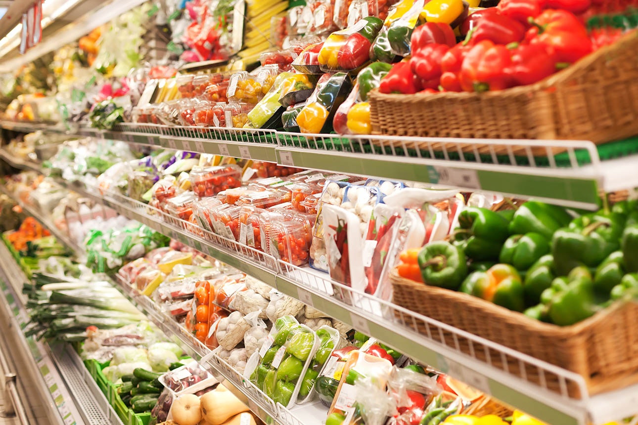 Fruit and vegetables on supermarket shelves.