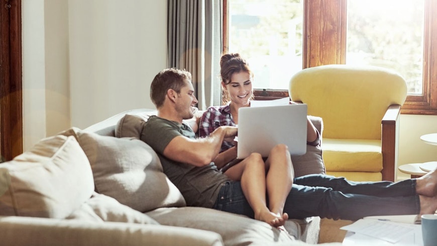 a couple review their options for an insurance provider