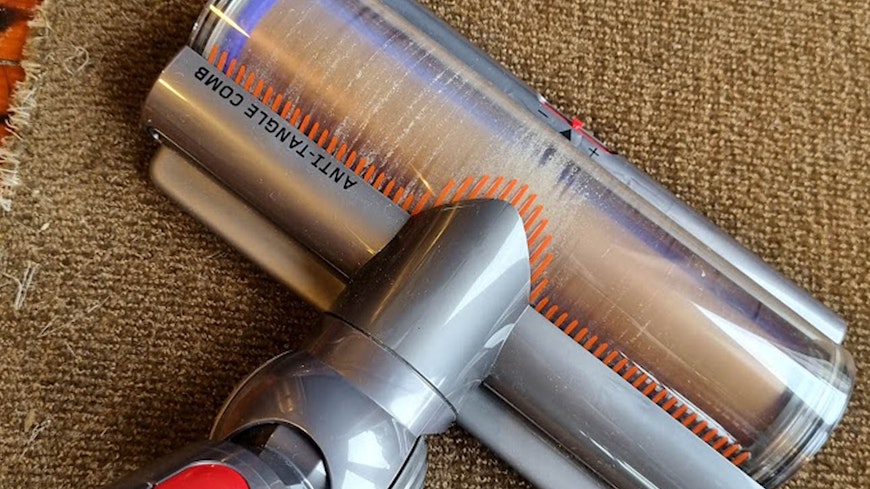 Image of Dyson vacuuming on carpet