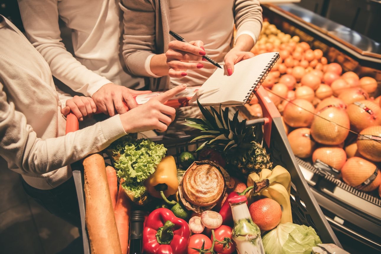 Image of three women grocery shopping