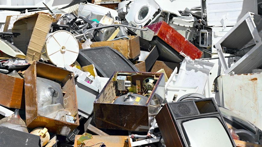 Image of broken appliances in landfill