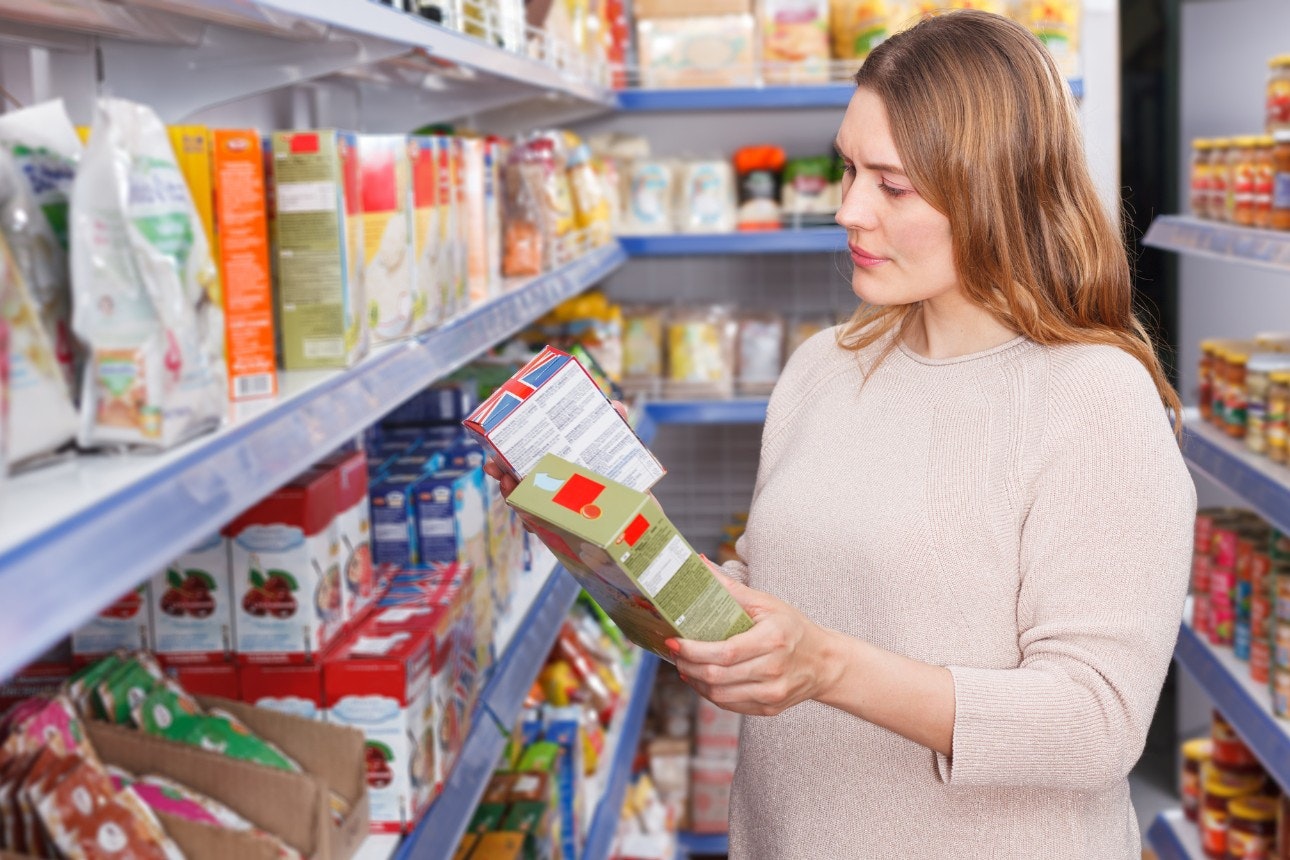 Image of a woman looking at packaged food