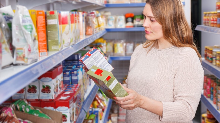 Image of a woman looking at packaged food