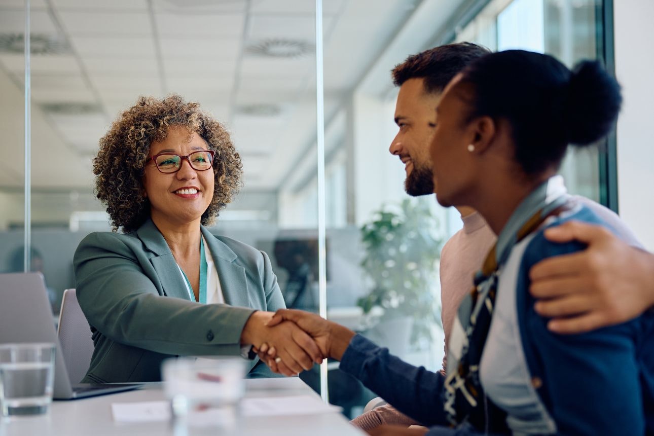 Image of a couple with a financial advisor