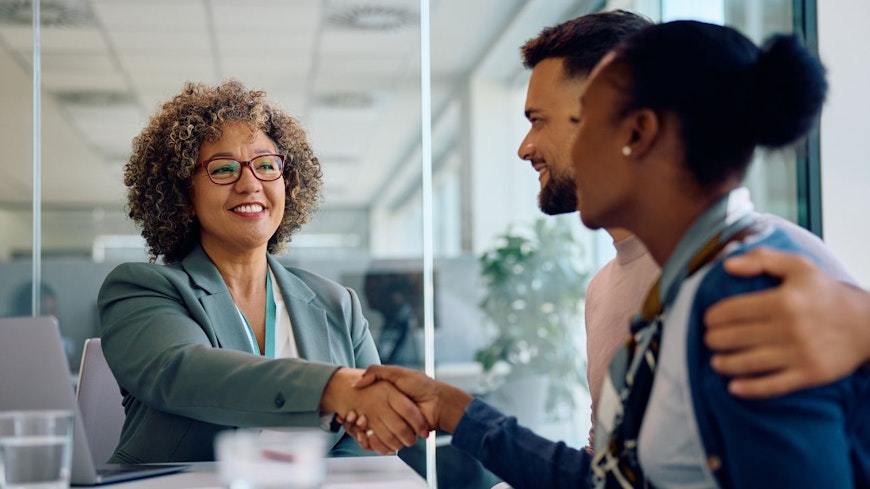 Image of a couple with a financial advisor