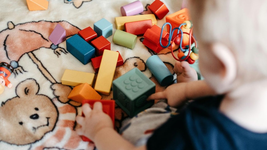 Baby playing with toys