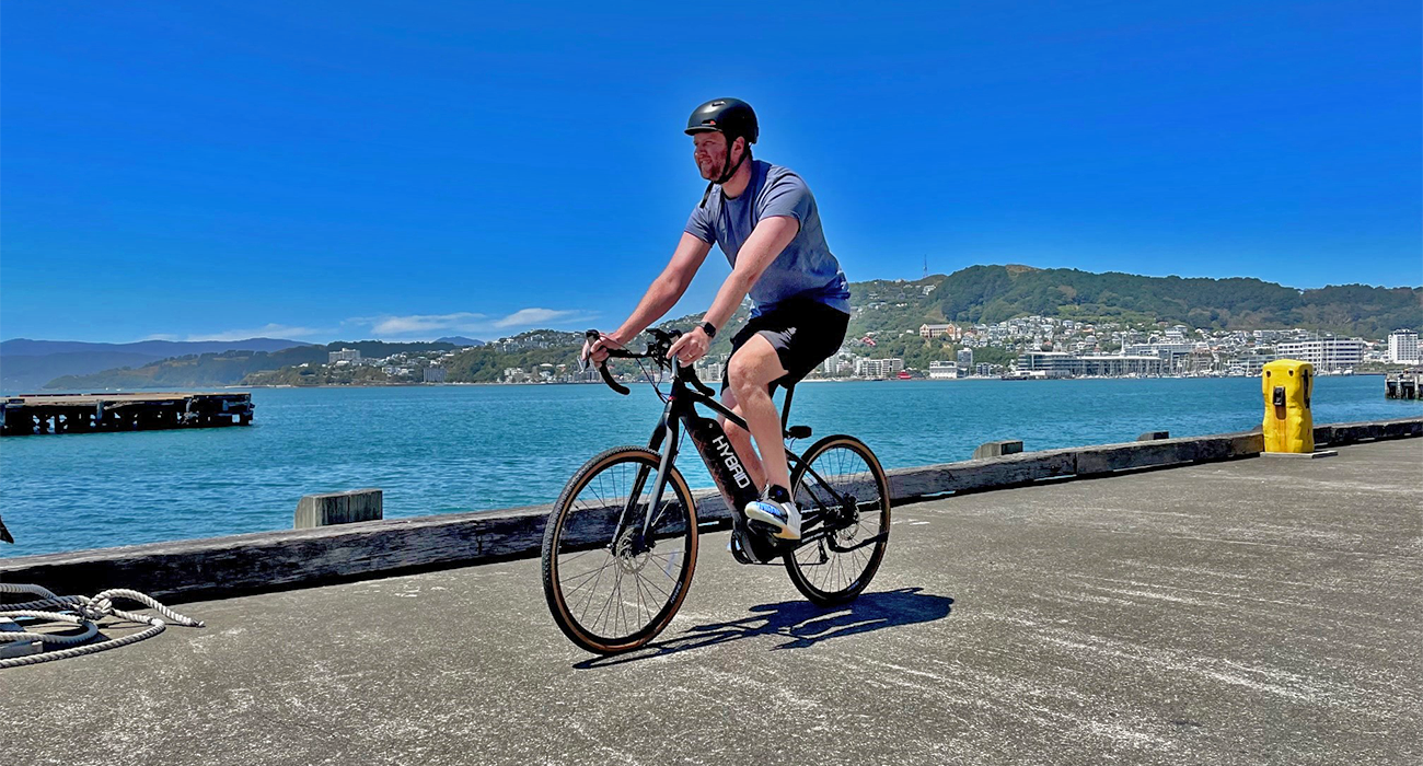 Photograph of writer testing e-bike on Wellington waterfront.