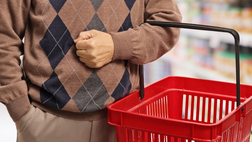 Image of a senior with a shopping basket
