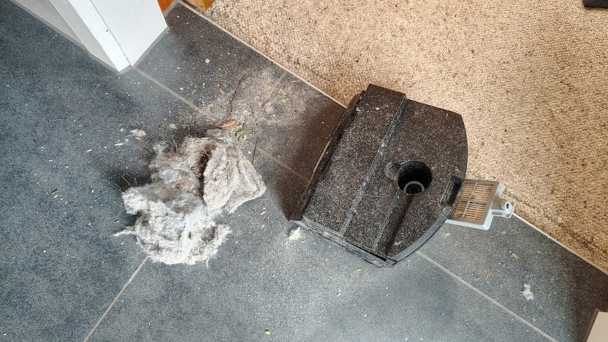 Checking the dust compactor bin can make a mess!