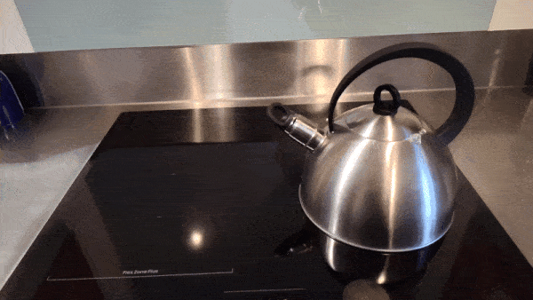 Whistling cap coming off kettle.